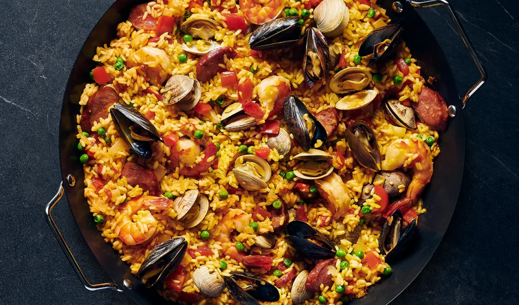 Si te bejme paella